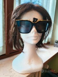 Occhiali da sole Naj Oleari con lenti trapezoidali