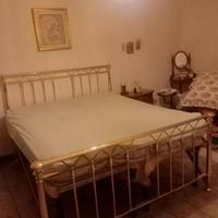 Letto placcato in oro