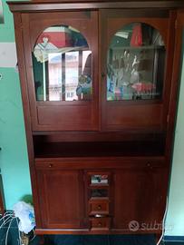 libreria con cassetti e tavolo interno 