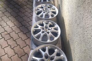 4 CERCHI LEGA ALFA ROMEO 15" PERFETTI