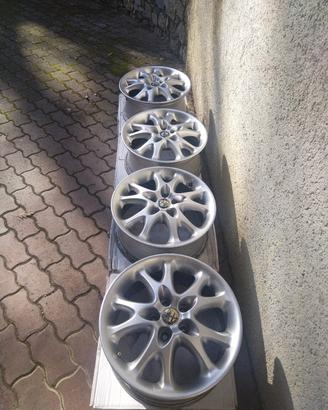 4 CERCHI LEGA ALFA ROMEO 15" PERFETTI