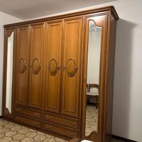 Camera da letto matrimoniale stile classico