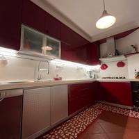 Cucina laccata lucida rosso rubino e acciaio