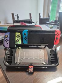 Nintendo Switch + Accessori e Giochi (Leggi bene)