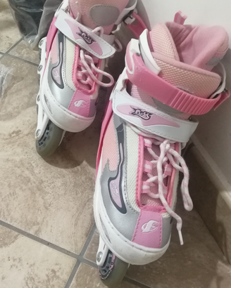 Pattini in linea misura 34/37 e protezioni nuove