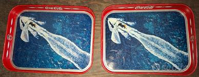 Vassoi pubblicitari della Coca-Cola