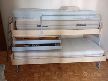 letto a ponte/scomparsa, simile ad un castello bas
