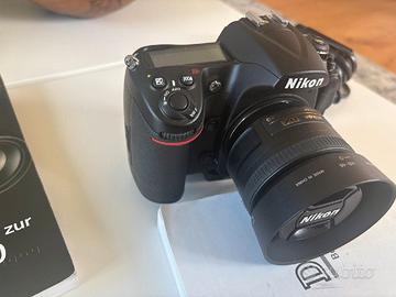 Fotocamera Nikon D300S con 4 obiettivi e accessori