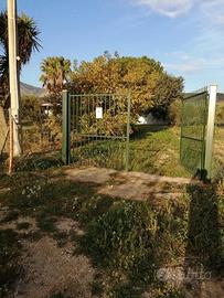 Terreno con casa