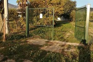 Terreno con casa