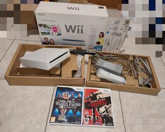 Wii con scatola e giochi 
