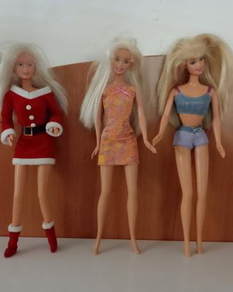 BARBIEin auto , cavallo, skateboard 