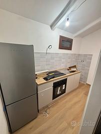 Bilocale ristrutturato e mobiliato in corte