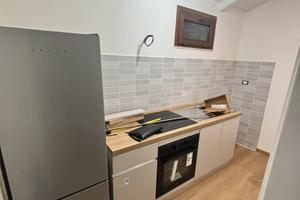 Bilocale ristrutturato e mobiliato in corte