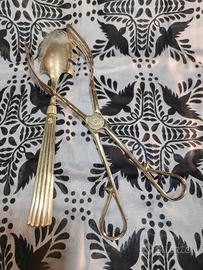 Set 2 pezzi vintage: cucchiaio servitore e pinza