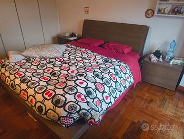 Camera da letto stile rovere scuro