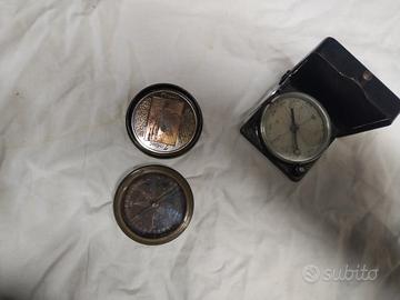 bussola monete medaglie