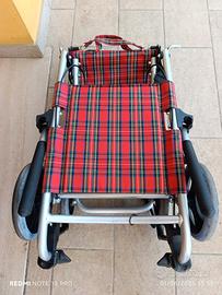 Carrozzina pieghevole