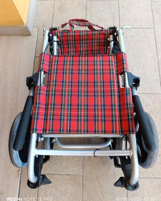 Carrozzina pieghevole