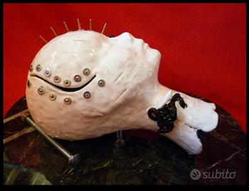 Coppia di teste in ceramica