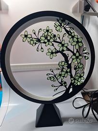 lampada circolare raffigurante un albero in Fiore