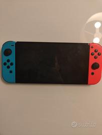 Nintendo switch OLED (con scatola e case) + giochi