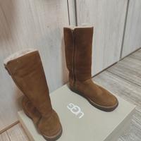 stok 2 giubotti  tgl s un paio di hugg n35/6 €90