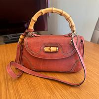 Borsa Gucci convertible pompon bamboo top handle