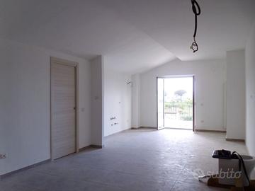 Grazioso appartamento con terrazzo a quarto