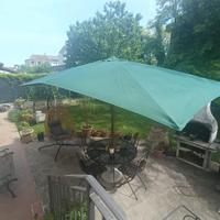 ombrellone 3x4 con basamento in cemento 