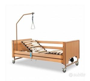 Letto elettrico con sponde e alzamalati ad altezza