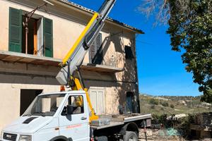 Piattaforma aerea escavatore