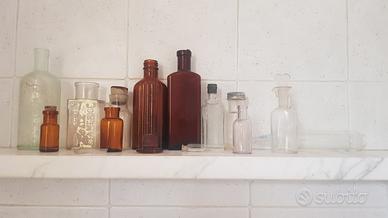 contenitori in vetro del passato per farmacia