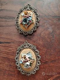 Coppia di quadretti ovali gemelli,cornici in metal