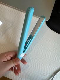 Mini piastra per capelli da viaggio azzurra