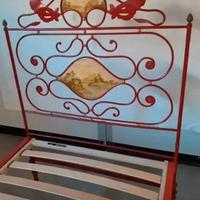 Letto decorato in ferro battuto