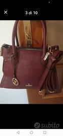 Borsa rossa bordeaux. YY Coveri 