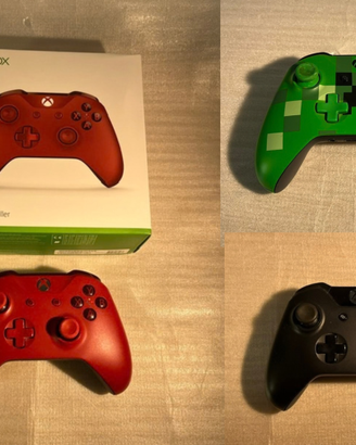 Tre controller Xbox ONE, rosso, verde e nero