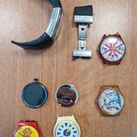 Parti di orologi Swatch, O-clock e Fossil Starck