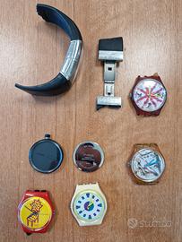 Parti di orologi Swatch, O-clock e Fossil Starck