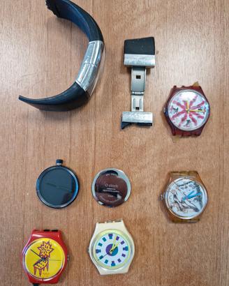 Parti di orologi Swatch, O-clock e Fossil Starck