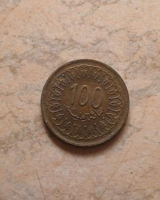 Moneta da 100 millimes tunisini, coniata nell'anno