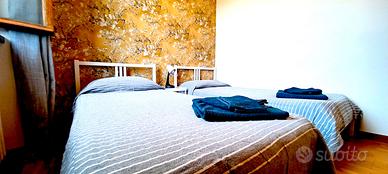 Camera singola con bagno in condivisione