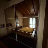 armadio scorrevole con ante a specchio