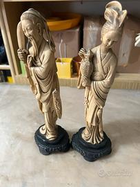 Copia di statue orientali con base