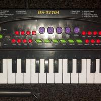 PIANOLA CON MICROFONO