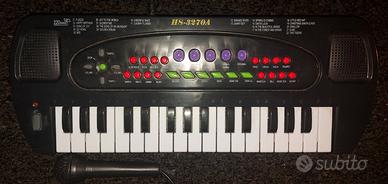 PIANOLA CON MICROFONO