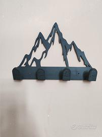 appendiabiti da psrete con montagne 