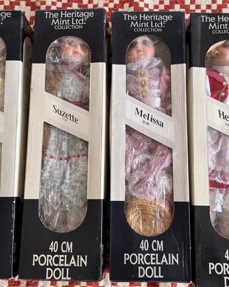 4 bambole in porcellana nuove
