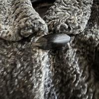 cappotto in astrakan